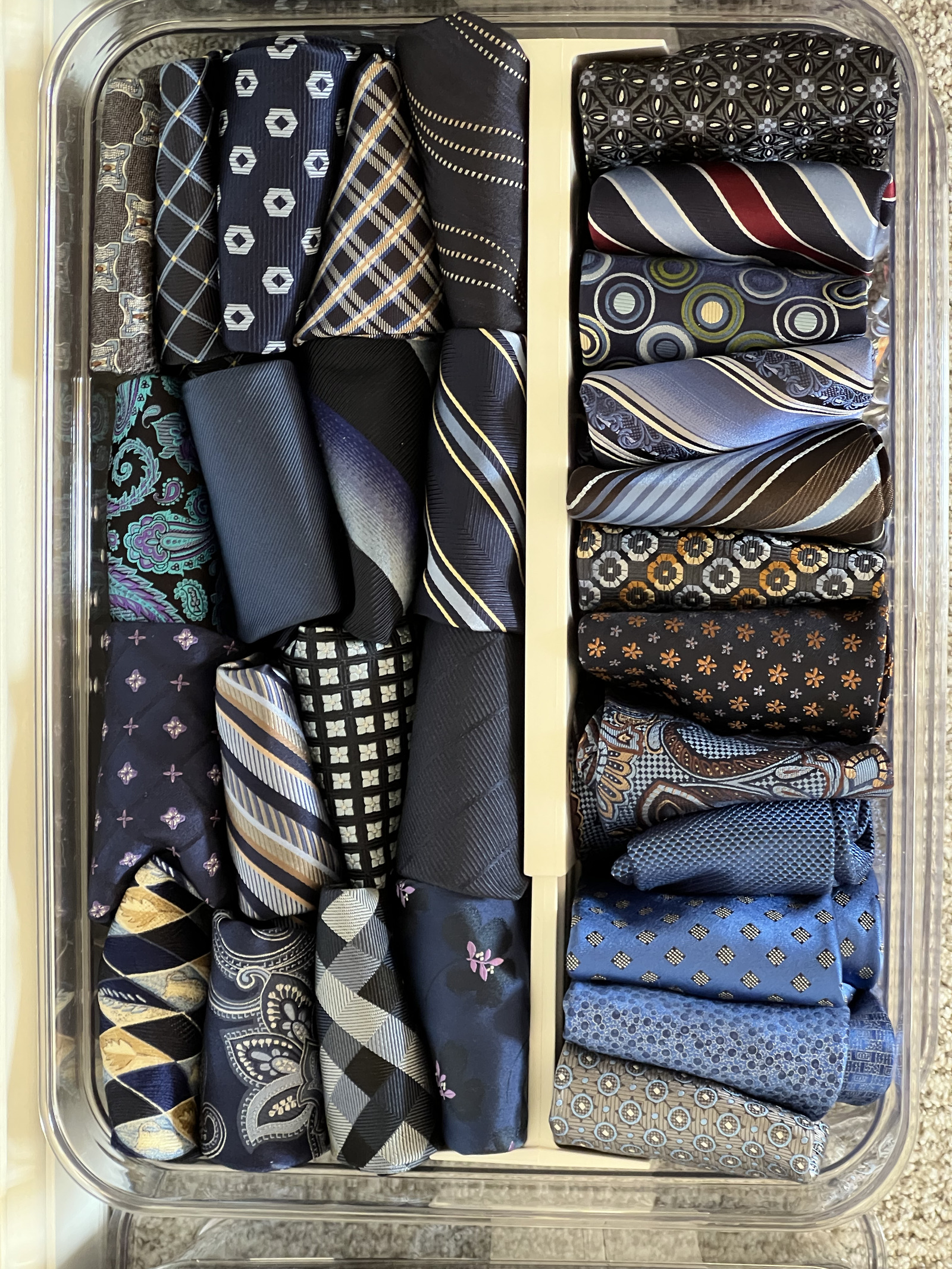 Professional menswear ties organized in a drawer