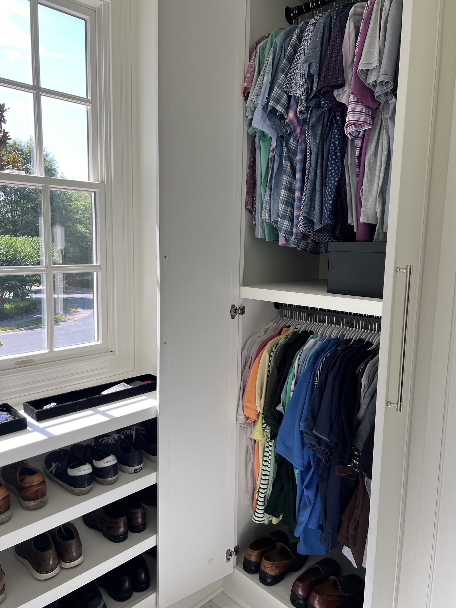 Main closet reveal of everyday polos and shoes