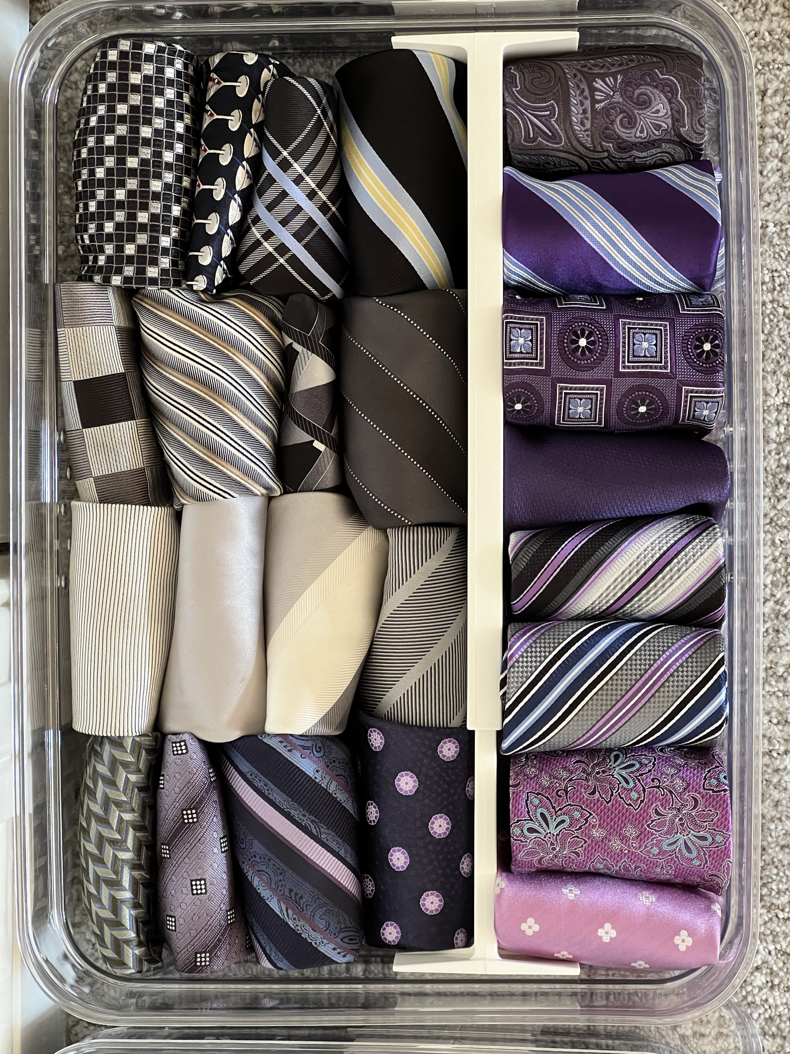 Professional menswear ties organized in a drawer