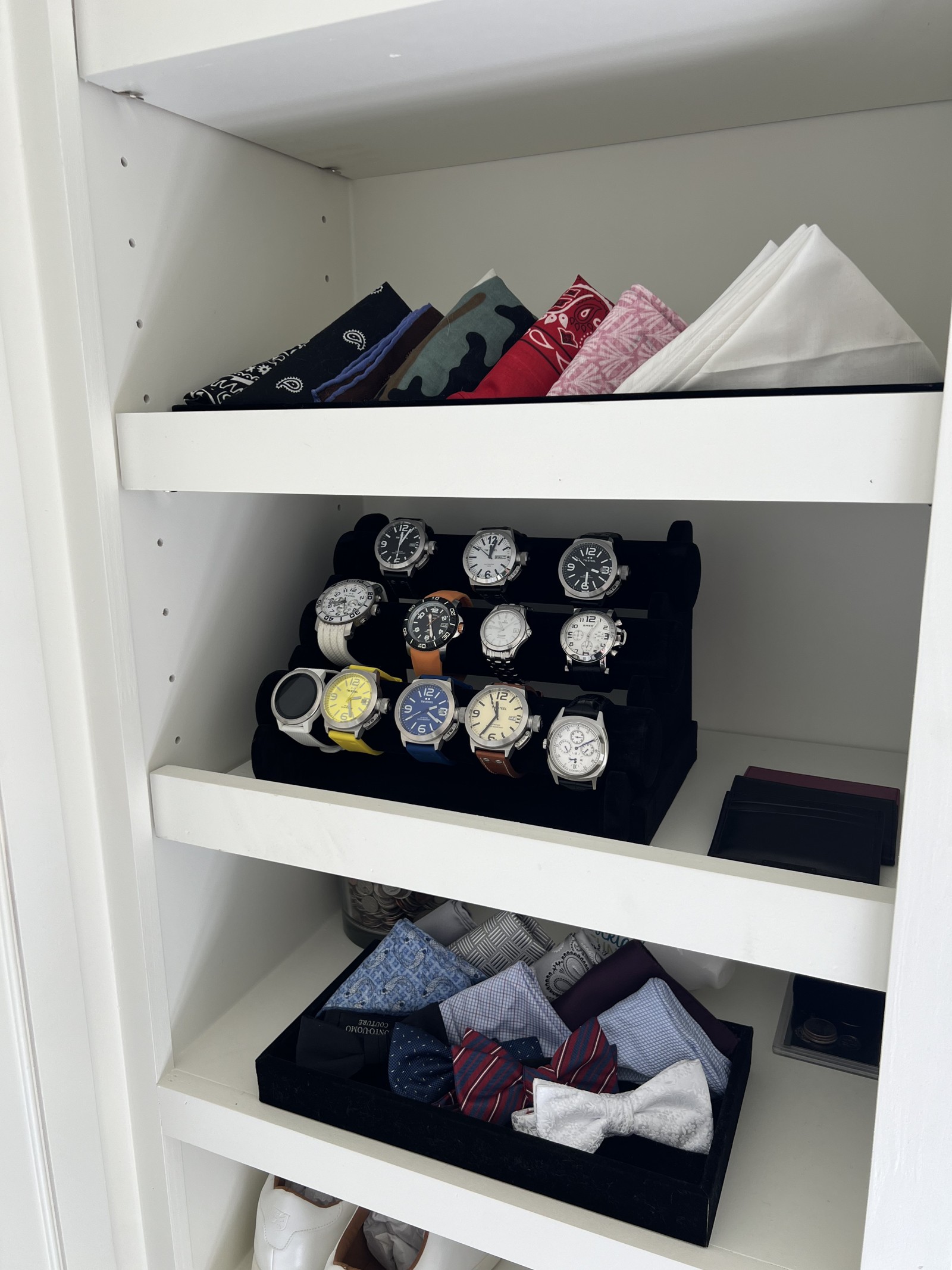 Main closet reveal of displayed accessories