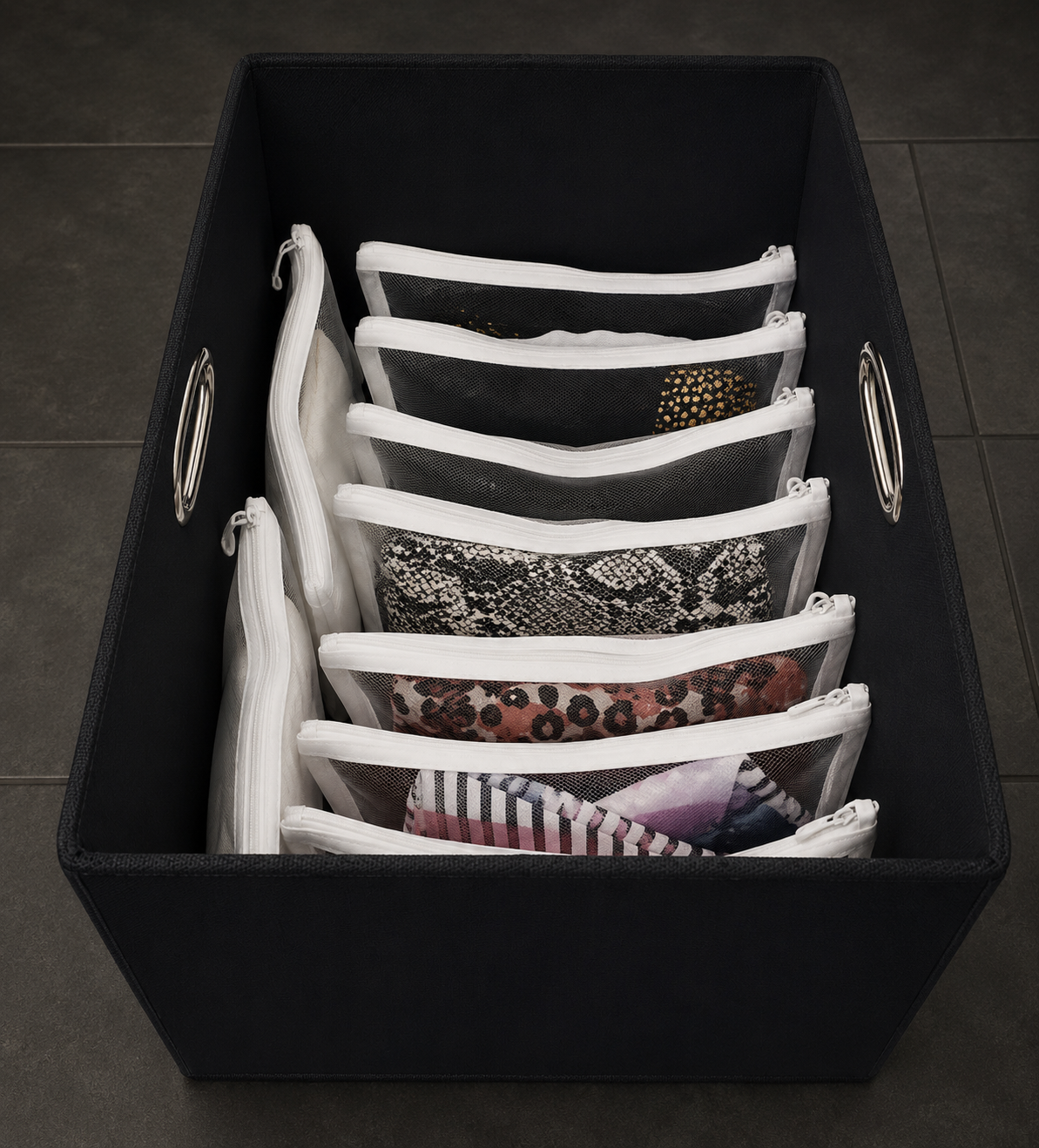 Mesh bags organizing swimsuits in a drawer